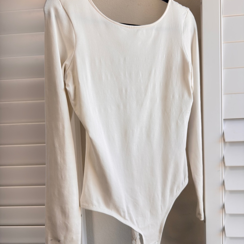 Madewell Cream Long Sleeve Bodysuit. Size large. ***Flaw: stain***